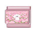 Bichon dans les cerisiers en fleurs